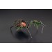 Collectible Handmade black spider sculpture with a rose and moss 