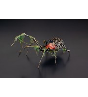 Collectible Handmade black spider sculpture with a rose and moss 