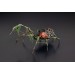 Collectible Handmade black spider sculpture with a rose and moss 