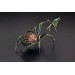 Collectible Handmade black spider sculpture with a rose and moss 