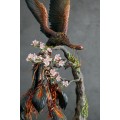 Collectible phoenix statue bird with sakura tree. Black fire bird