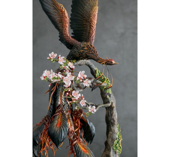 Collectible phoenix statue bird with sakura tree. Black fire bird