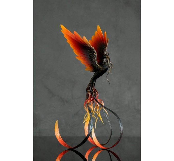 Handmade Phoenix statue bird. Dark fire bird