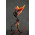 Handmade Phoenix statue bird. Dark fire bird