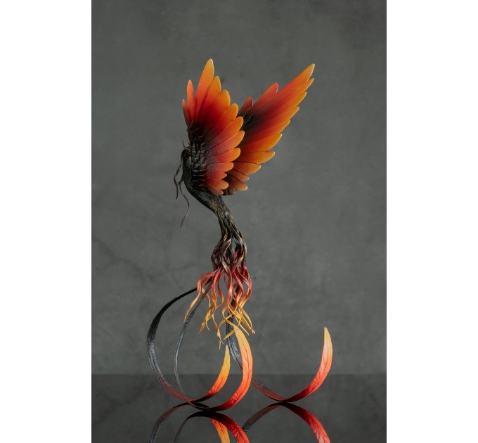 Handmade Phoenix statue bird. Dark fire bird