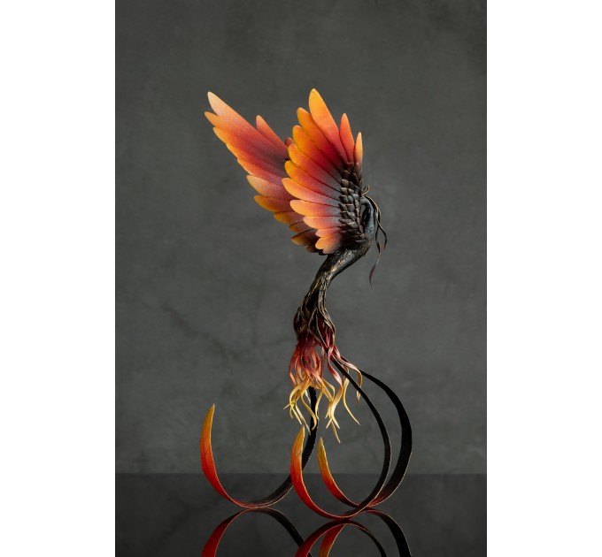 Handmade Phoenix statue bird. Dark fire bird