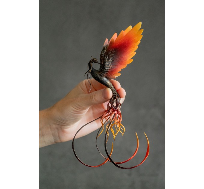 Handmade Phoenix statue bird. Dark fire bird