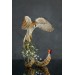 Collectible Owl sculpture with a fire butterfly. OOAK