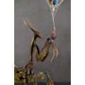 Sculpture of a mantis. Art handmade 