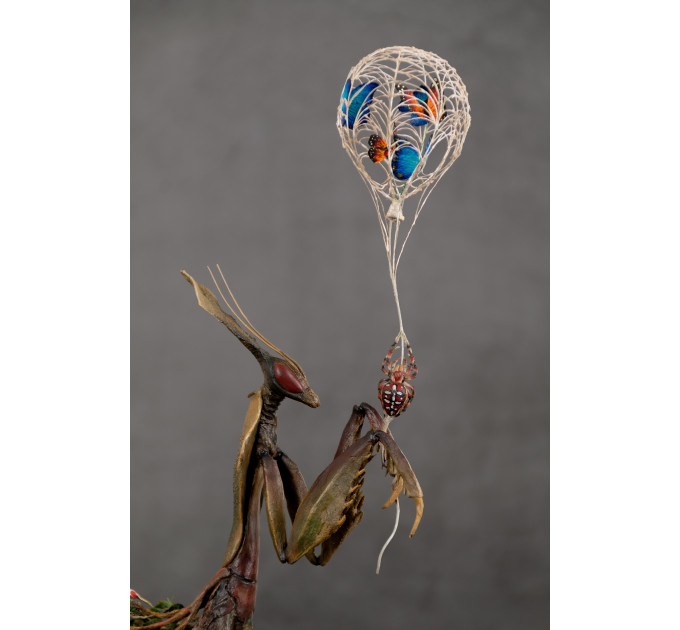 Sculpture of a mantis. Art handmade 