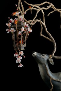 Sculpture of deer with a lantern