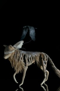  Sculpture wolf with a crow
